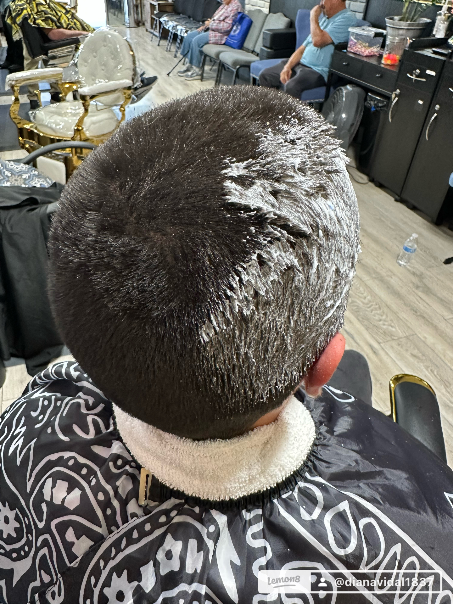 Fresh cut in progress at the chair