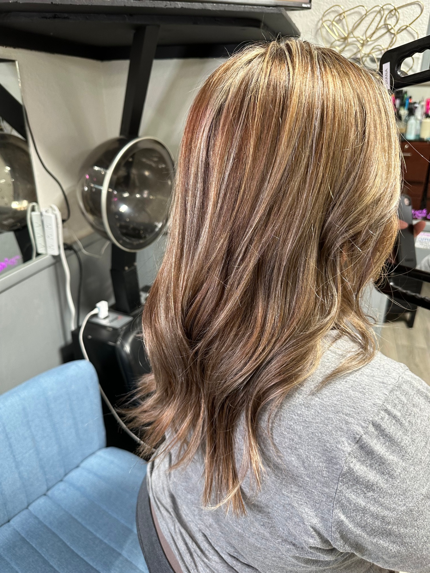 Warm blonde highlights with soft layers