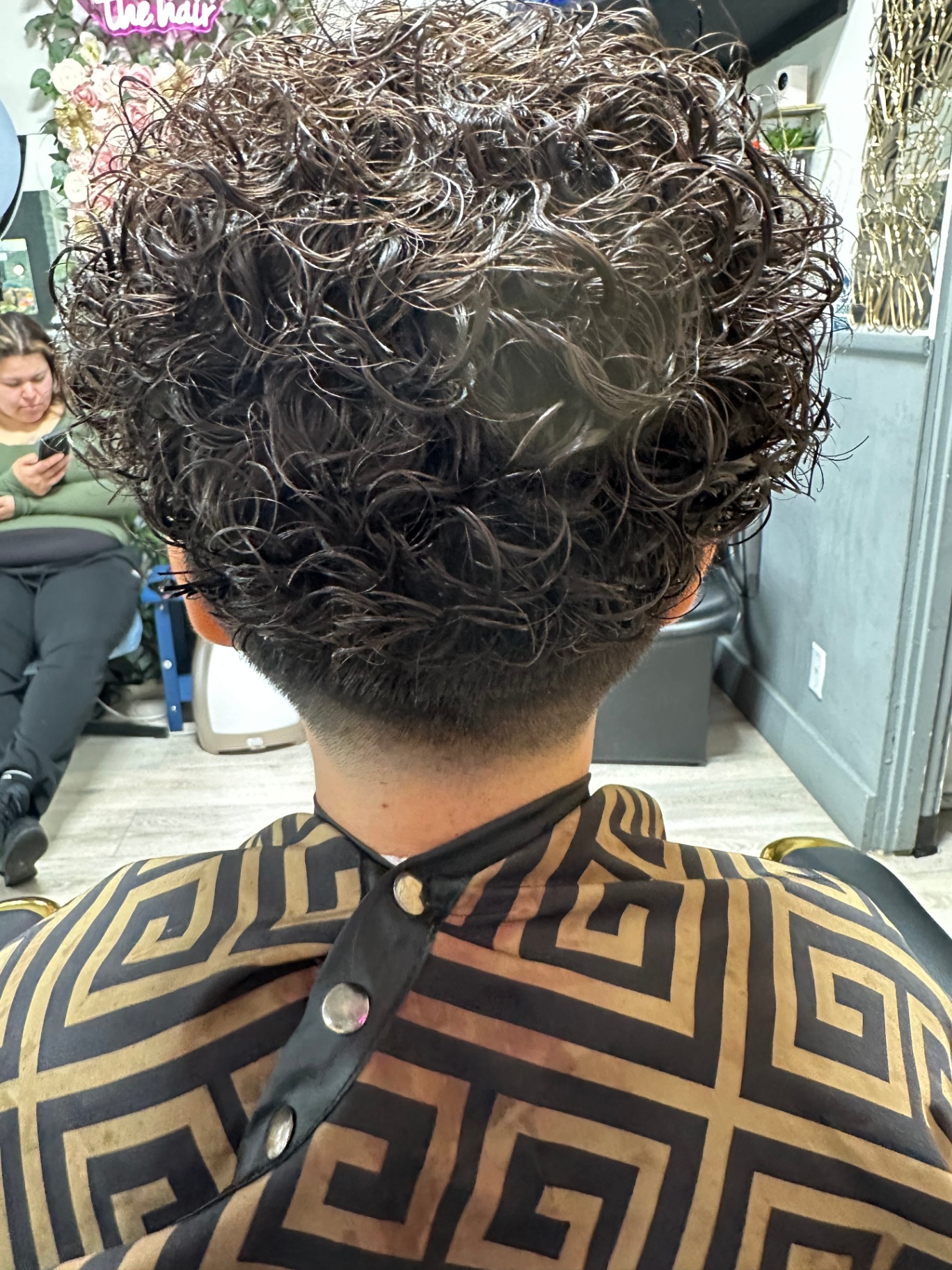 Full curly top with tapered sides